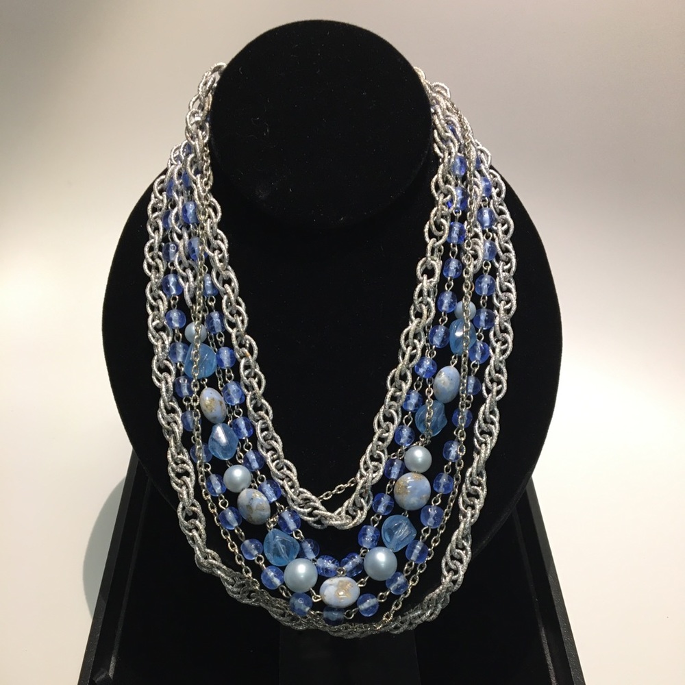 Light blue stone and silver metal necklace